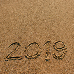 New Year 2019 is coming concept. Happy New Year 2019 replace 2018 concept on the sea beach
