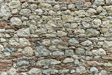 old wall with gray stone blocks
