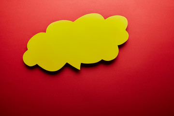 top view of empty thought bubble on red background
