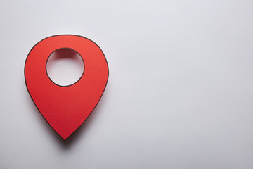 red geolocation icon on grey background