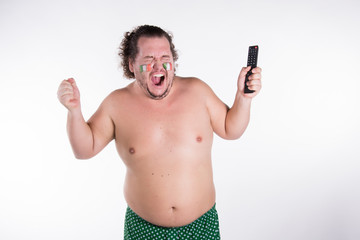 Fototapeta premium Irish fan watching tv 