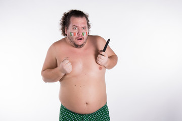 Fototapeta premium Irish fan watching tv 