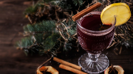 Mulled wine with spices and fruits. Space for text
