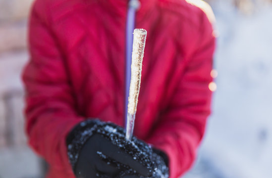 Icecicle in Child's Hands, Kid with Icecicle