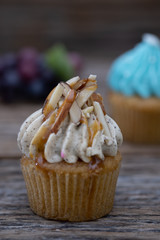 Tasty mini cupcakes on a vintage background, sweet dessert for christmas, new year and valentine holliday