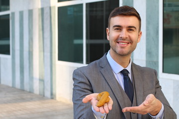 Businessman with poop in his hand 