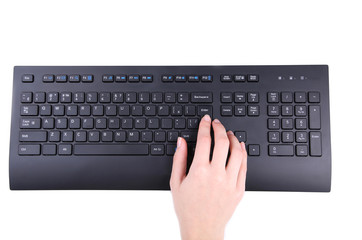 Female hands or woman office worker typing on the black keyboard. Isolated on white background