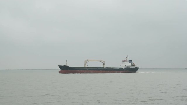 the dry cargo ship is on the sea