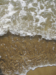 Foam on a Sandy Beach, Waves in the Ocean