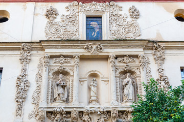 facade of a historic church in Seville, Spain