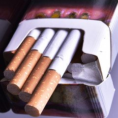 pack of cigarettes with a filter on a gray background for use in the body