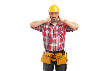Builder covering ears.