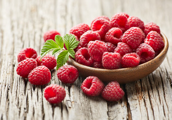 Raspberry on wooden background