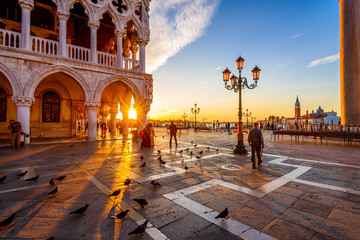 Sunrise view of piazza San Marco, Doge's Palace (Palazzo Ducale) in Venice, Italy. Architecture and landmark of Venice. Sunrise cityscape of Venice. - obrazy, fototapety, plakaty