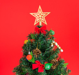 Christmas tree background and Christmas decorations, red background.
