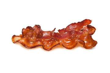 Fried bacon rashers isolated on white background.