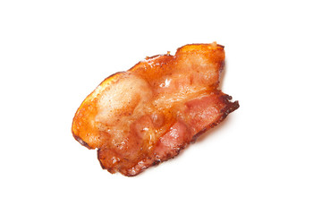 Fried bacon rashers isolated on white background.
