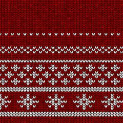 Red knitted fabric with a white ornament  with snowflackes.