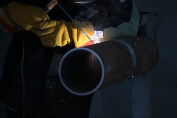The electric welding process.Arc welding process