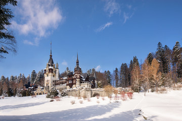 Peles castle in Romania. Beautiful, royal castle in snowy, white winter. 