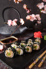 Maki rolls with avocado and unagi sauce. Sushi menu. Japanese food. 