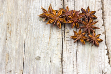 star anise on old wooden background