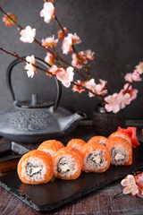 Philadelphia roll sushi with salmon, cream cheese. Sushi menu. Japanese food.