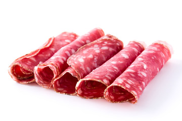 fresh salami sausage slices isolated on white background
