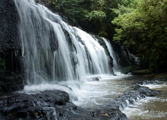 A landscape with the Purakaunui Falls in the Catlins in the South Island in New Zealand