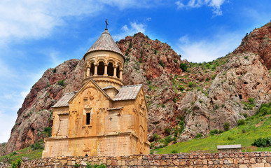 Fototapeta na wymiar Scenic Novarank monastery in Armenia. against dramatic sky. Noravank monastery was founded in 1205. It is located 122 km from Yerevan in narrow gorge made by Darichay river nearby city of Yeghegnadzor