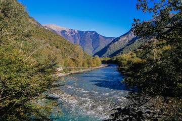 Landscape with blue mountain river. autumn view