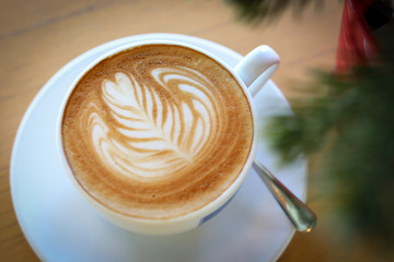 heart shape latte art of hot coffee drink tasty in cafe restaurant