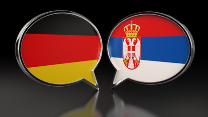 Obraz premium Germany and Serbia flags with Speech Bubbles. 3D illustration