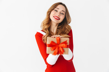 Cheerful young girl wearing Christmas dress