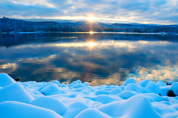 White swans on a colorful lake © mikhailgrytsiv