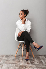 Attractive young african business woman wearing shirt