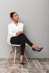 Attractive young african business woman wearing shirt