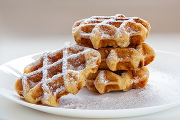 Breakfast waffles . Morning background. in a light key close-up