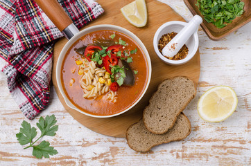 Thick red soup with pasta