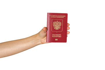 hand holding a passport on an isolated white background