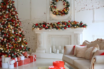 White wiith red Christmas decorations, Christmas tree, gifts, fireplace