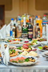 delicious dishes on the table in the restaurant. serving table.