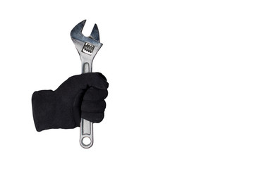 gloved hand holding a nut wrench on an isolated white background
