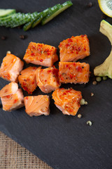Poke bowls with salad and cucumber on the slate