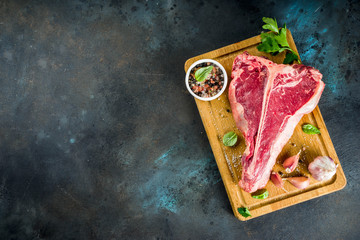 Raw t-bone steak