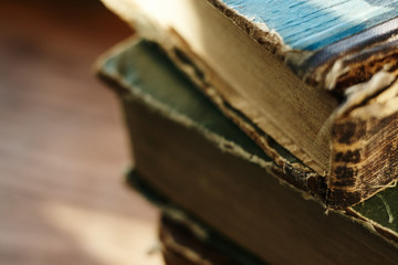 old shabby vintage books of classical literature are in a pile