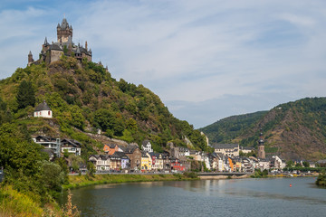 Fototapeta na wymiar Beautiful summer view of the city of Cochem on the Moselle River with Cochem Imperial Castle.