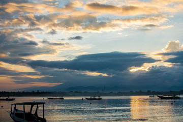 boat on calm ocean in the morning