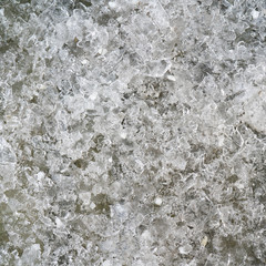 Many pieces of broken ice, close-up, texture, background.