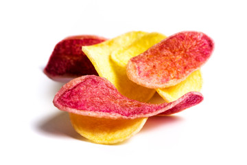 Fototapeta na wymiar Red and Yellow Potato chips on a pile